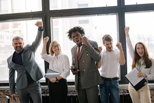 entrepreneurs celebrating their team’s achievements