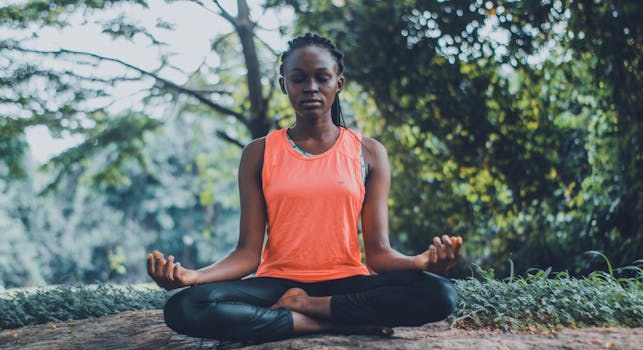 a person meditating in a tranquil setting