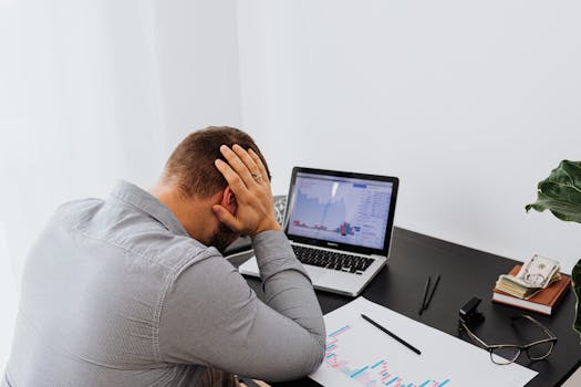 a tired entrepreneur at their desk