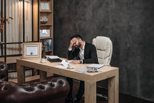 A stressed entrepreneur at a desk