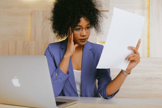 image of a stressed entrepreneur at a desk