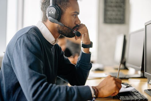 a stressed employee looking at a screen