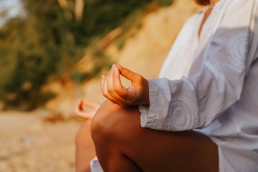 calm person meditating in nature