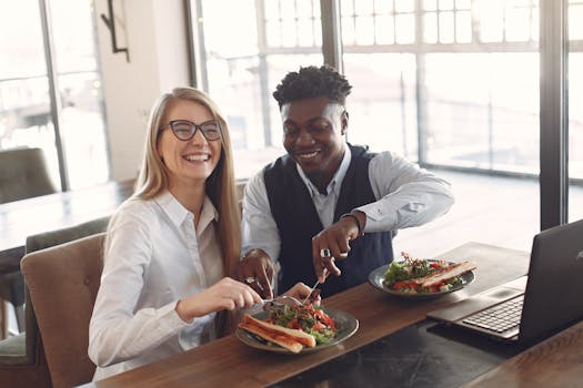 happy entrepreneur enjoying a healthy meal