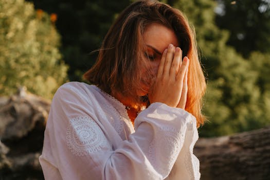 a person meditating in nature