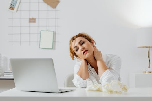 tired entrepreneur at desk