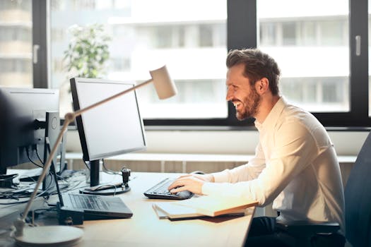 image of a person looking stressed at a computer