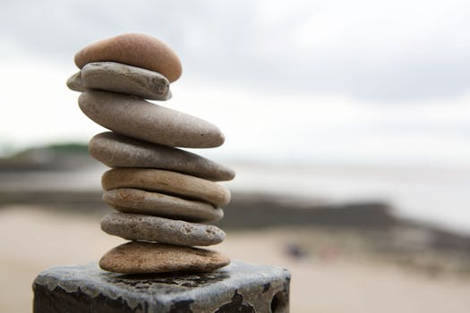 image of a balanced rock sculpture to symbolize stability