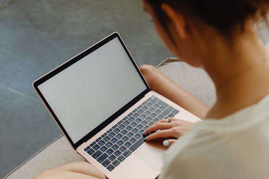 screenshot of a person staring blankly at a computer screen