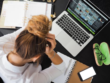 Overworked entrepreneur at their desk